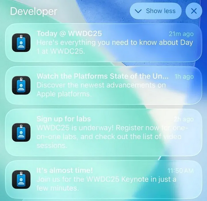 iPhone screen showing Apple’s new “liquid glass” UI with notifications from the Developer app, featuring blurred, translucent backgrounds and low-contrast text that makes content hard to read, highlighting major usability and accessibility concerns.